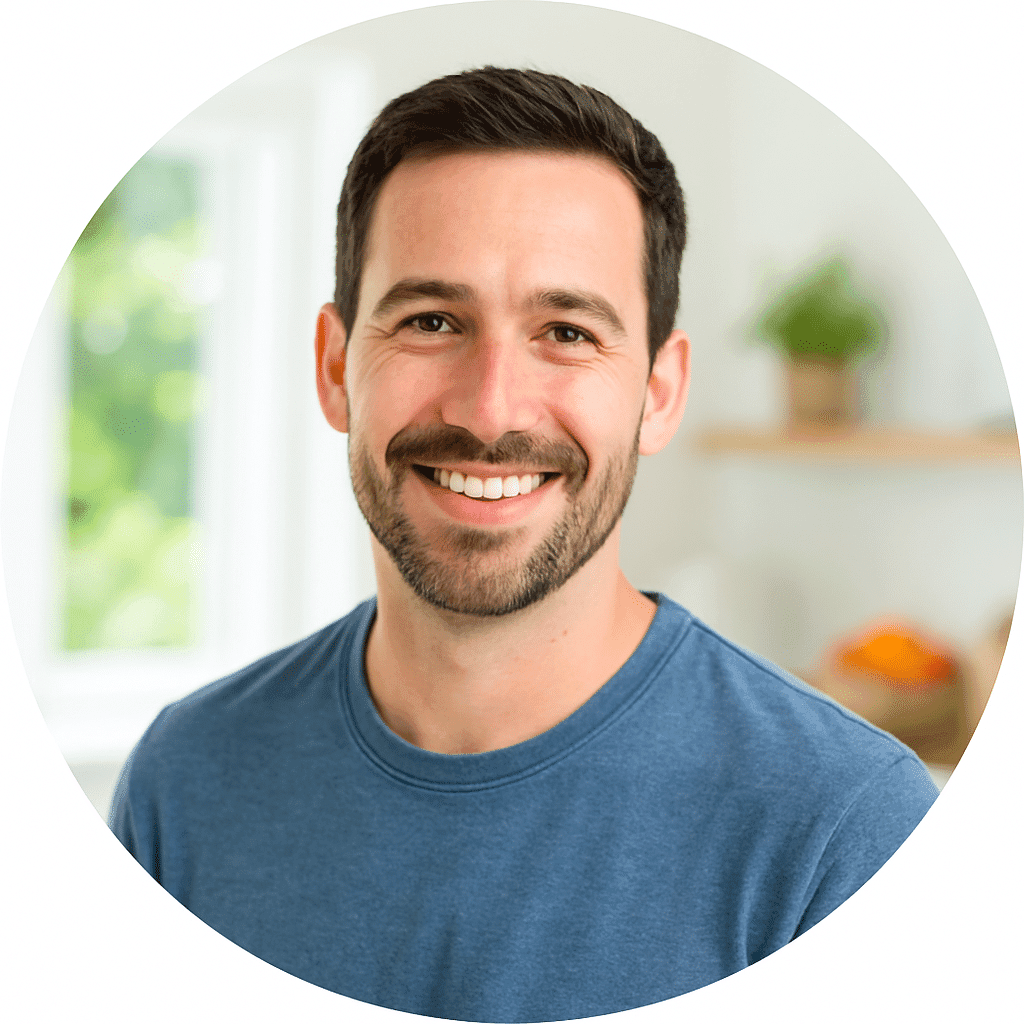 Ethan Miller – Chef and Food Photographer at Sena Recipes, smiling in a bright kitchen setting.