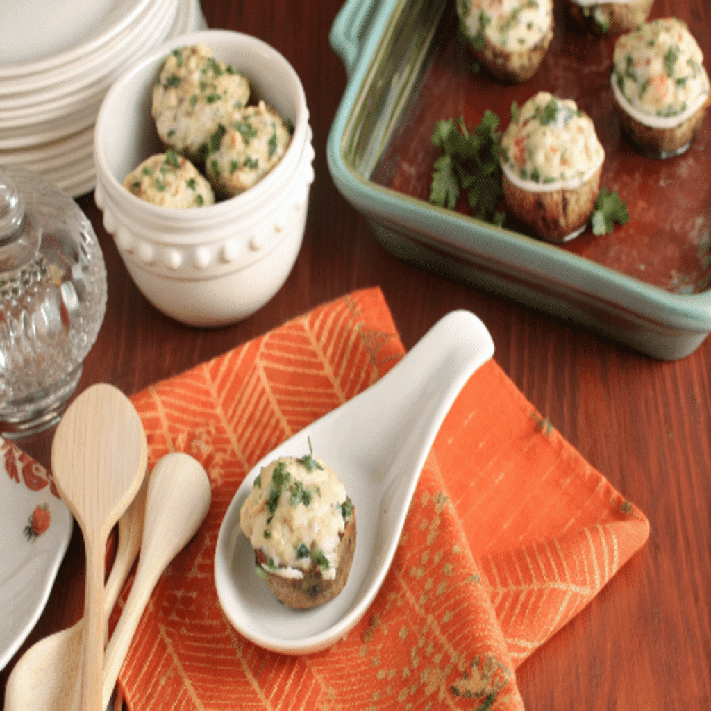 Herb and Cheese Stuffed Mushrooms served on a platter as a party appetizer